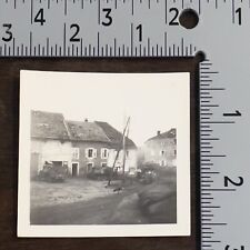 WWII MILITARY PHOTOGRAPH BOMBED HOUSES AND TANK, POSTMARK JANUARY 12, 1945 picture