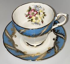 Paragon Bone China Turquoise Gold Tea Cup and Saucer Floral Center picture
