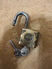 vintage yale padlock with key 2 keys brass metal shiny lock picture