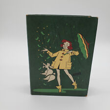 Vintage 1950's Paper Penny Coin Bank Girl in the Rain picture