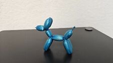 balloon animal dog statue - shimmering blue color picture