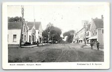 Newport Maine~Main Street~Up Hill Store Fronts~Fella Leans Bicycle on Curb~1905 picture