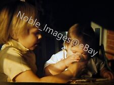 1959 Cute Toddler Helping Baby Highchair Kodachrome 35mm Slide picture