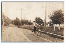 New Berlin Ohio OH Postcard RPPC Photo Boy Riding Bicycle Dirt Road c1910's picture