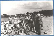 Beautiful guys and girls in swimsuits on the beach Vintage photo picture