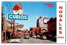 c1960 Nogales Sonora's Main Shopping Street Cars Avenida Obregon Mexico Postcard picture