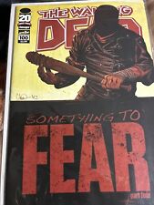 100 issues Walking dead picture