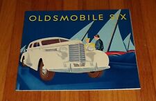 Original 1937 Oldsmobile Six Deluxe Sales Brochure Coupe Sedan Convertible picture