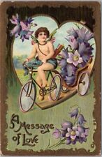 1912 VALENTINE'S DAY Postcard Flower Delivery Cupid on BICYCLE 
