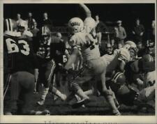 1985 Press Photo Lansingburhh HS football players battle Albany Academy players picture