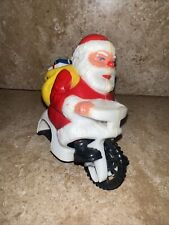 Antique Santa on a motorcycle early plastic/celluloid picture