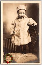 A Merry Christmas Baby Girl Photograph Standing On A Chair Postcard picture