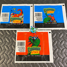 DINOSAURS ATTACK ALL THREE WAX WRAPPERS 2xBLUE,RED TOPPS 1988 BUY MORE AND $AVE picture