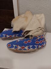vintage Indian moccasins, embroidered with beads. picture