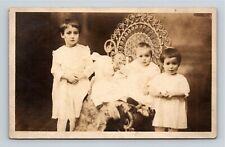 4 Sad Children Baby with Pacifier & Scrolling Wicker Chair Sepia RPPC picture