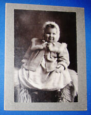 ANTIQUE MOUNTED PHOTO OF A DARLING LITTLE CHILD WEARING LOVELY WINTER FASHION picture