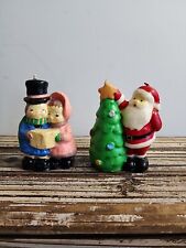 Vintage Candles Santa Decorating A Tree & Carolers Lot Of 2 Candles picture