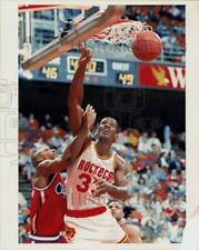 1990 Press Photo Rockets basketball player, Otis Thorpe, fouled by Ken Norman picture