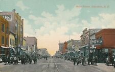 ABERDEEN SD – Main Street showing Horse Drawn Carriages and Streetcar Tracks picture