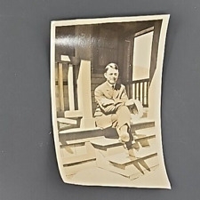 Vintage Photograph Handsome Man in Suit Sitting on Porch Steps Holding Cap Sepia picture