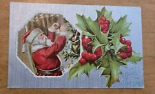 Santa Decorating Tree Embossed Christmas Postcard With Silver Background picture