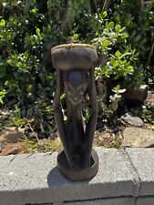 Hand carved wooden woven African squatting statue holding bowl from Bali-13x5 in picture
