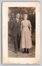 RPPC Young Couple by Tree Lady with Necklace AZO 1904-1918 ANTIQUE Postcard 1430 picture