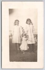 RPPC Two Edwardian Girls With Large Antique Doll cReal Photo Postcard A48 picture
