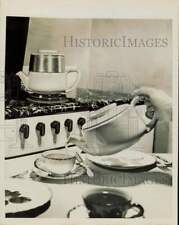 1950 Press Photo A lady serves coffee using drip coffee pot - nei31004 picture