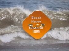 1985  BEACH  HAVEN  NEW  JERSEY SEASONAL  BEACH  BADGE/TAG  39  YEARS  OLD picture
