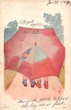1907 Comic Postcard of Children Cuddling Under an Umbrella picture