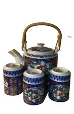 Antique porcelain set with three glasses and its jug decorated with flowers... picture