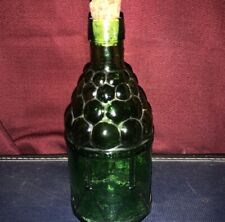 Vintage Wheaton NJ Collectible 7 3/4” Tall Cannonballs On Top Green Glass Bottle picture