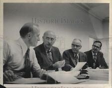 1972 Press Photo Group confers during meeting in Saratoga, New york - tub09713 picture