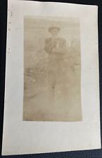 RPPC Man is Suit & hat outside eating an Apple c1910's (faded) LS picture