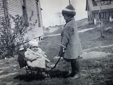 Vintage Photo Negative 1930s Child Pulling Baby In Tiny Wagon Sled Carriage picture