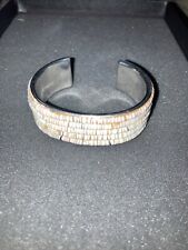 UNUSUAL NATURAL OLIVE SHELL HEISHI BEAD CUFF BRACELET, 5 ROW picture