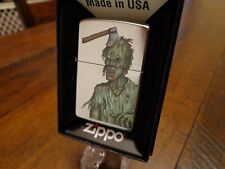 ZOMBIE WITH AXE IN HEAD SKULL ZIPPO LIGHTER MINT IN BOX picture