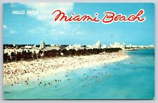 Hello from Miami Beach FL 1969 Postcard Aerial View Coastline Hotels Sunbathers picture