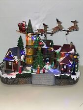 Holiday Living Christmas Animated Flying Santa And Reindeer LED lighted Village/ picture