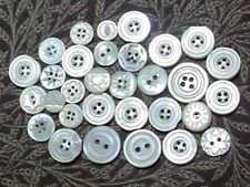 32 SMALL ANTIQUE CARVED MOTHER OF PEARL BUTTONS 2 AND 4 HOLE SEW THROUGH picture
