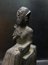 Replica of KING TUTANKHAMUN sitting down with the Egyptian hieroglyphs picture