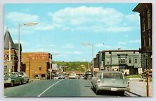 c1950s~Newport Vermont VT~Main Street~Gas Station~Montgomery Ward~VTG~Postcard picture