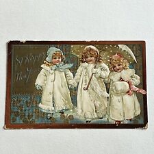 Antique Embossed Tuck’s Postcard Adorable Children Girls Umbrella Snow New Year picture