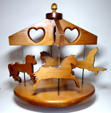 Vintage Handcrafted Wooden Spinning Carousel Four Horses · Wood and Brass picture