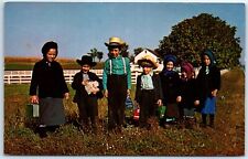A group of colorfully dressed Amish school children - The Amish Country - PA picture
