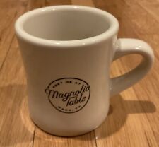 MAGNOLIA TABLE RESTAURANT COFFEE MUG- “WHERE EVERYONE HAS A SEAT AT THE TABLE” picture