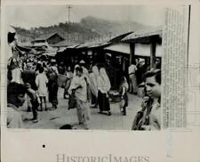 1963 Press Photo Residents Shop in Kalimpong, India, After Trade Caravans Cut picture