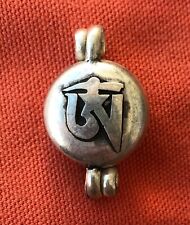 Tibetan Amulet (or Ghau) Metal Alloy w Tibetan Om and Endless Knot for Dharma picture