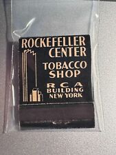 MATCHBOOK - ROCKEFELLER CENTER TOBACCO SHOP - RCA BUILDING - UNSTRUCK BEAUTY picture